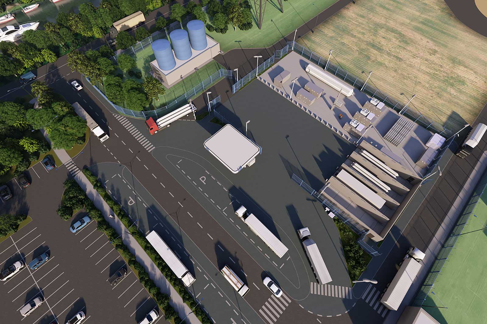 Eine Luftaufnahme eines Logistikzentrums mit Lkw, Fahrspuren, Parkplätzen und Lagereinheiten.